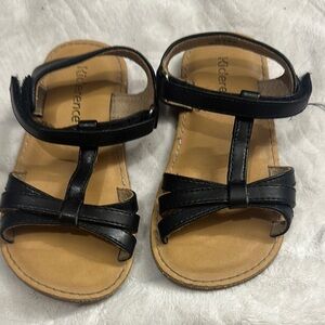 Black and Tan Sandals with T-Strap Design
